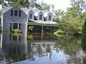 House surrounded with floodwaters
